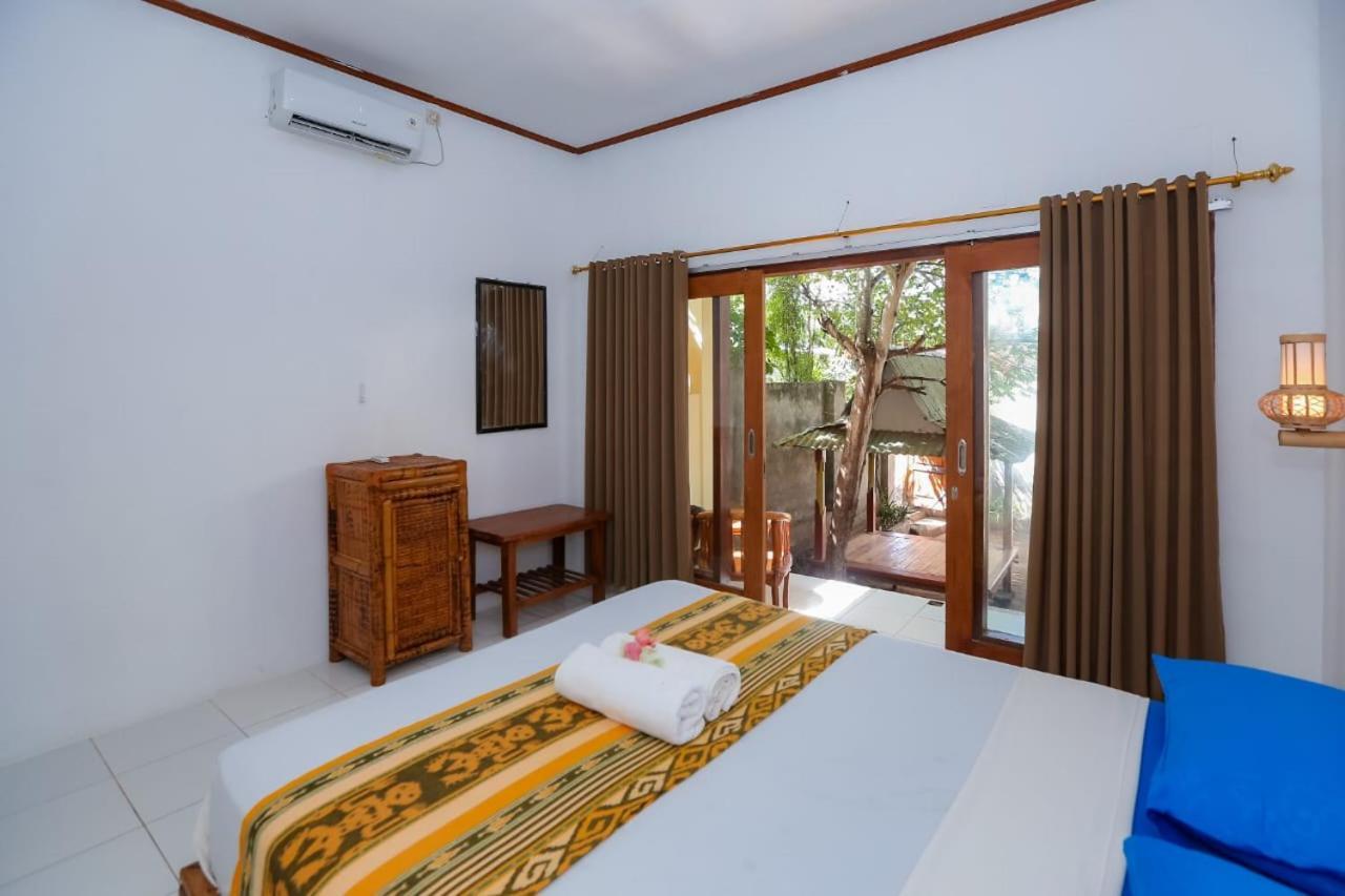 Radika House Apartment กีลีตราวางัน ภายนอก รูปภาพ